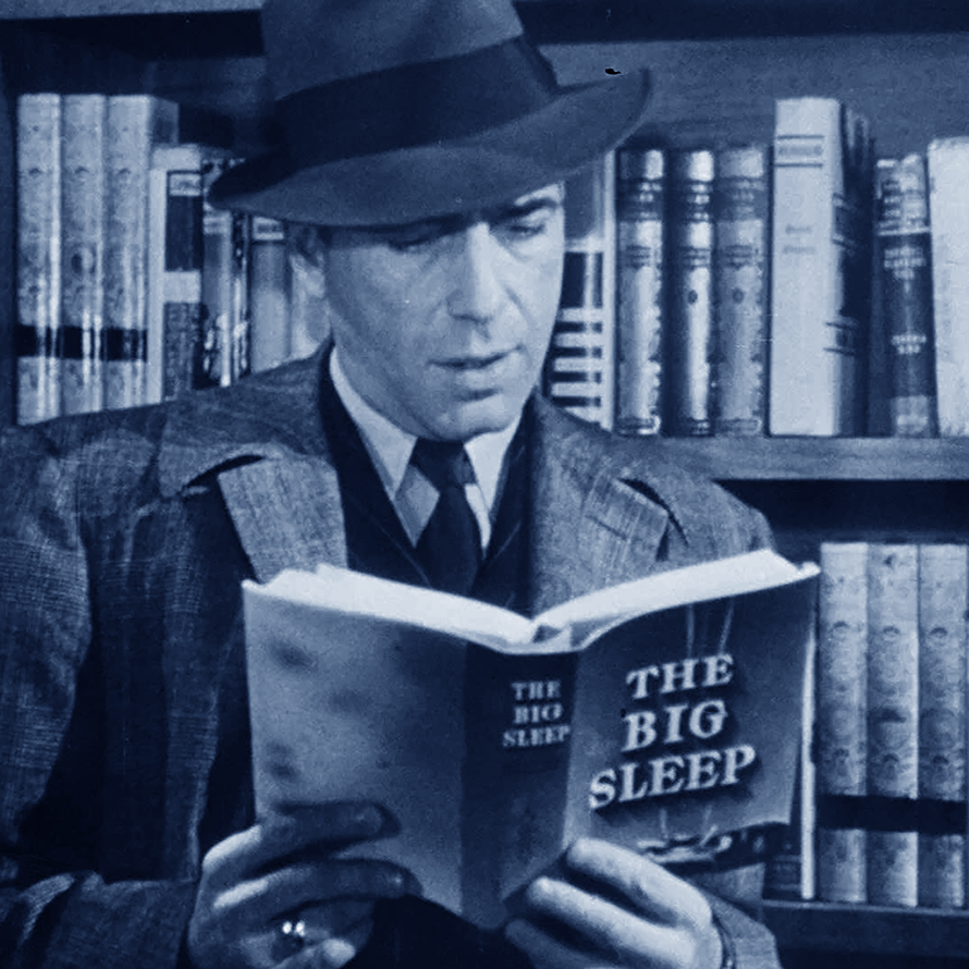Still from the Howard Hawks adaption of Raymond Chandler's The Big Sleep. Humphrey Bogart playing detective Philip Marlowe is in a book shop reading a hardback copy of The Big Sleep